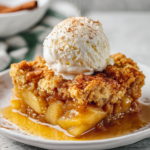 Cozy Apple Cobbler for the Holidays Delicious spiced apple cobbler dessert perfect for autumn gatherings, bursting with flavor and warmth, served warm with ice cream.