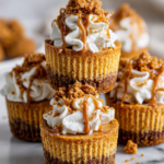 Delicious Mini Biscoff Cheesecakes for Cozy Holidays Mini Biscoff cheesecakes topped with Biscoff cookies, a delicious dessert for holidays