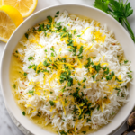 Easy Greek Lemon Rice, a vibrant and comforting side dish recipe perfect for holidays, featuring creamy rice, lemon zest, and fresh herbs.